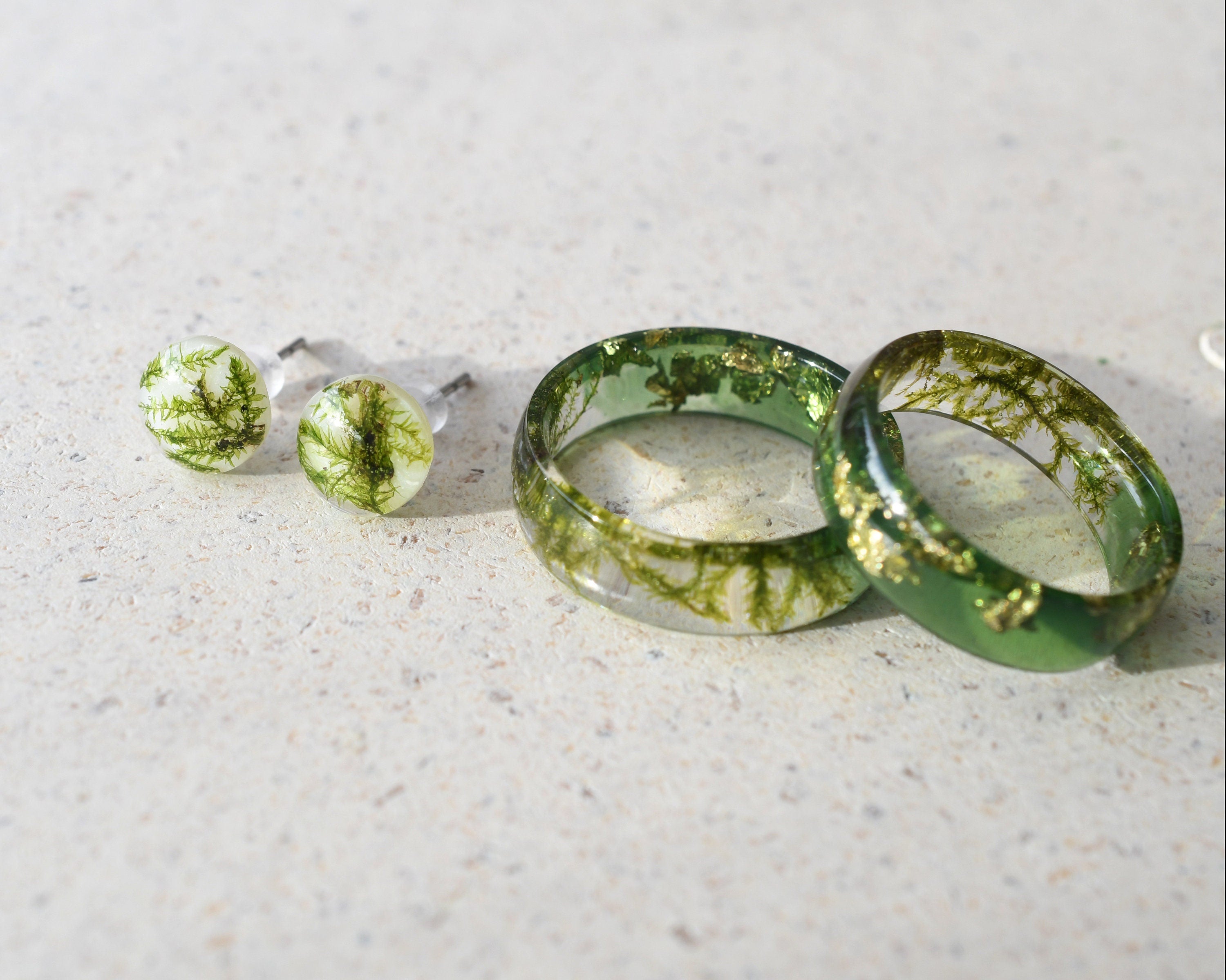 a couple of rings sitting on top of a table