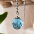 Water-like resin pendant with real seed