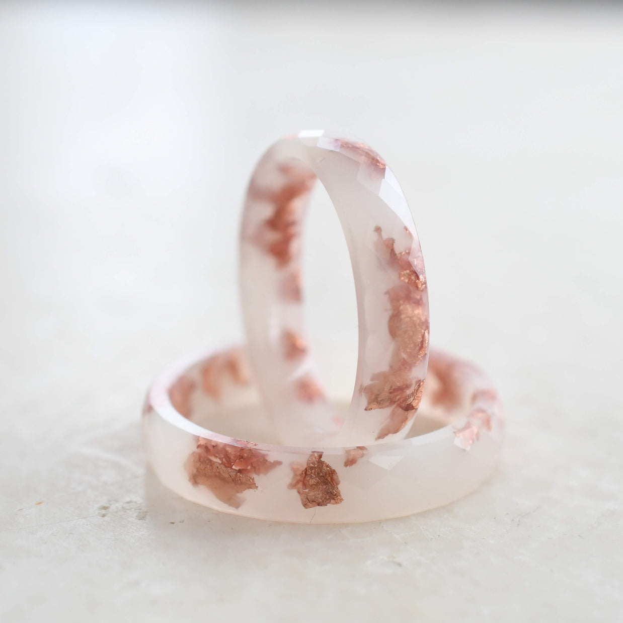 Ivory Ember Ring by Resity — faceted off-white resin ring with rose gold leaf detail