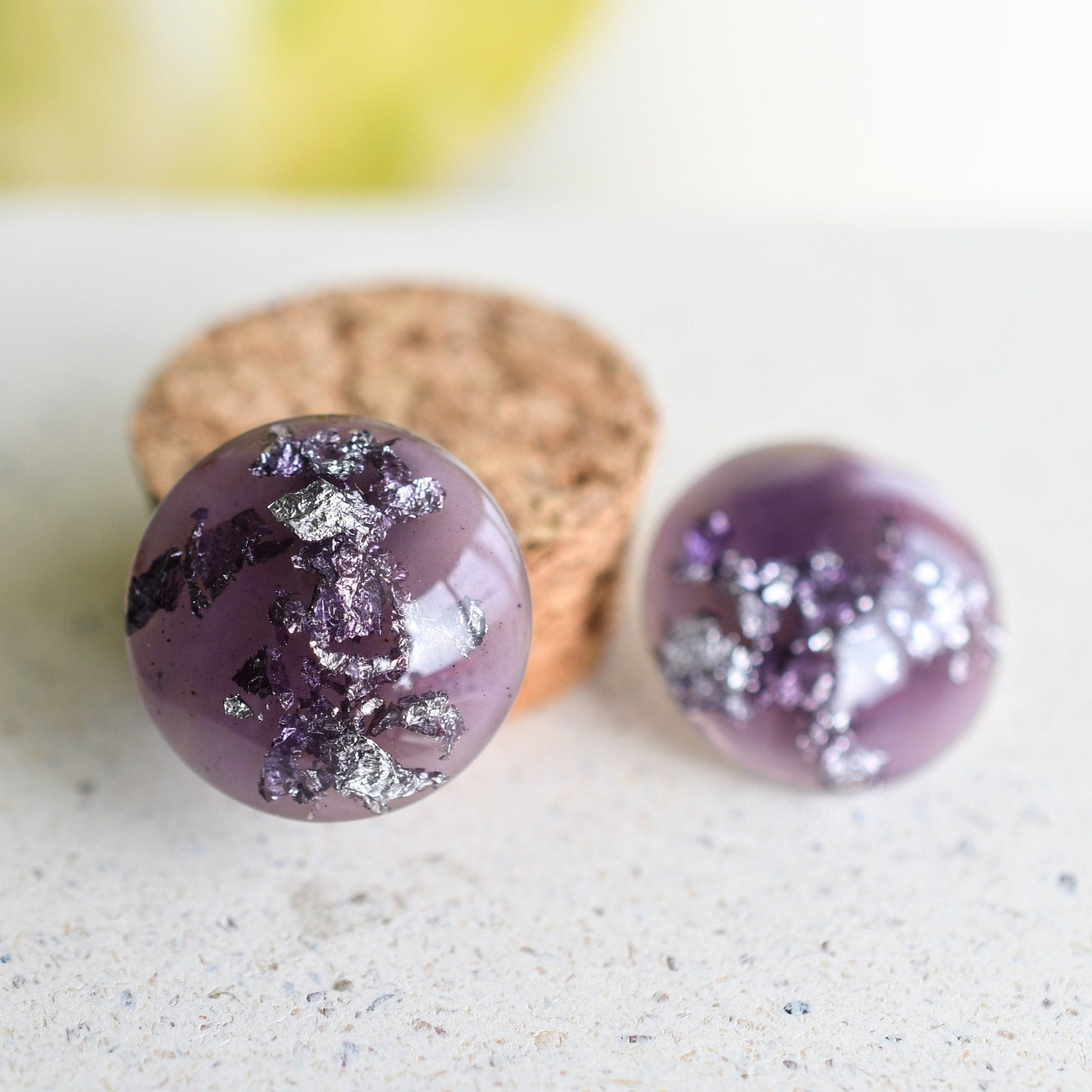 Handmade lavender resin stud earrings with silver leaf by Resity in Vienna