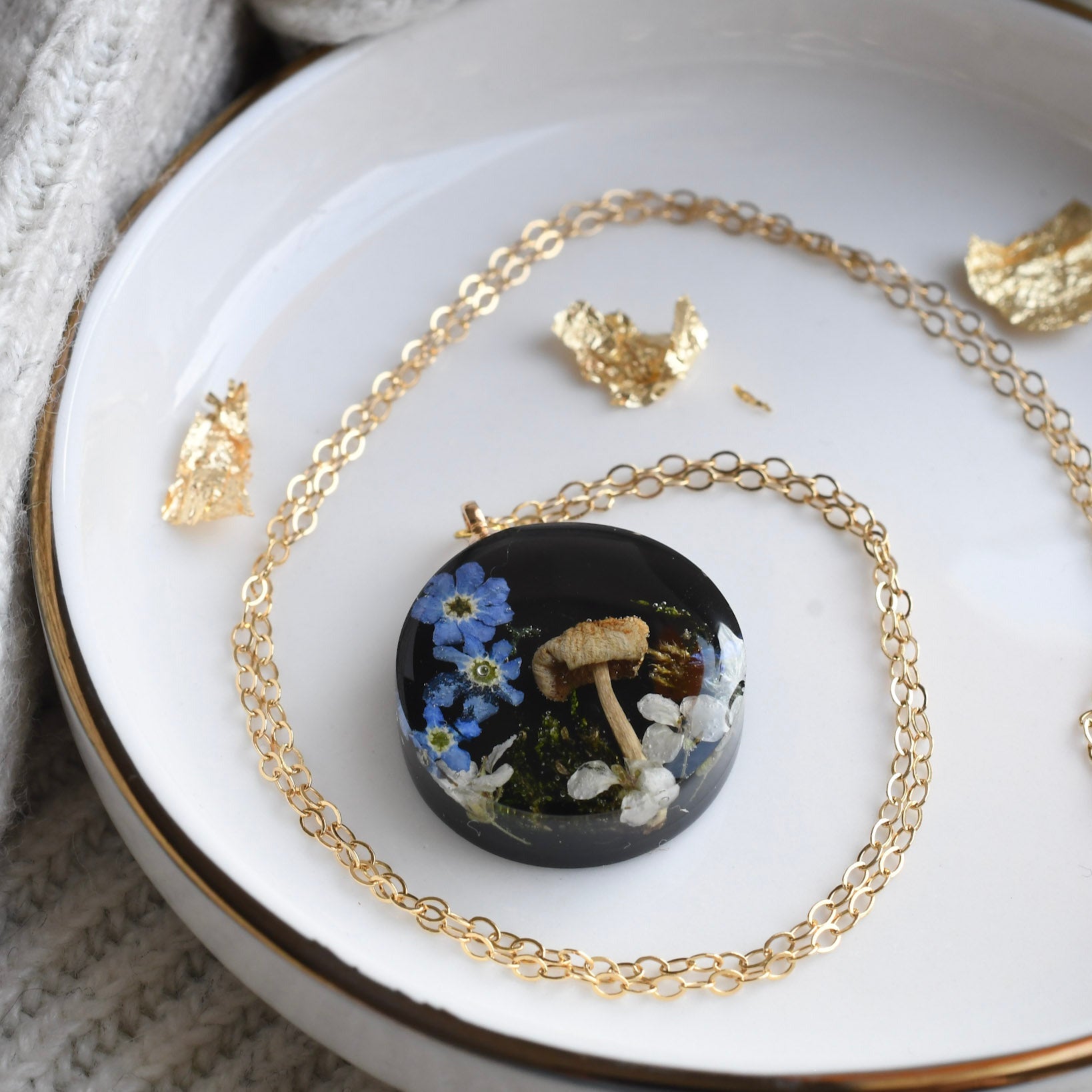 Midnight Grove Necklace with moss, mushroom, forget-me-nots, and alyssum — handmade resin pendant from Vienna