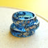 Flatlay of Midnight Signal Ring showing navy resin with silver accents