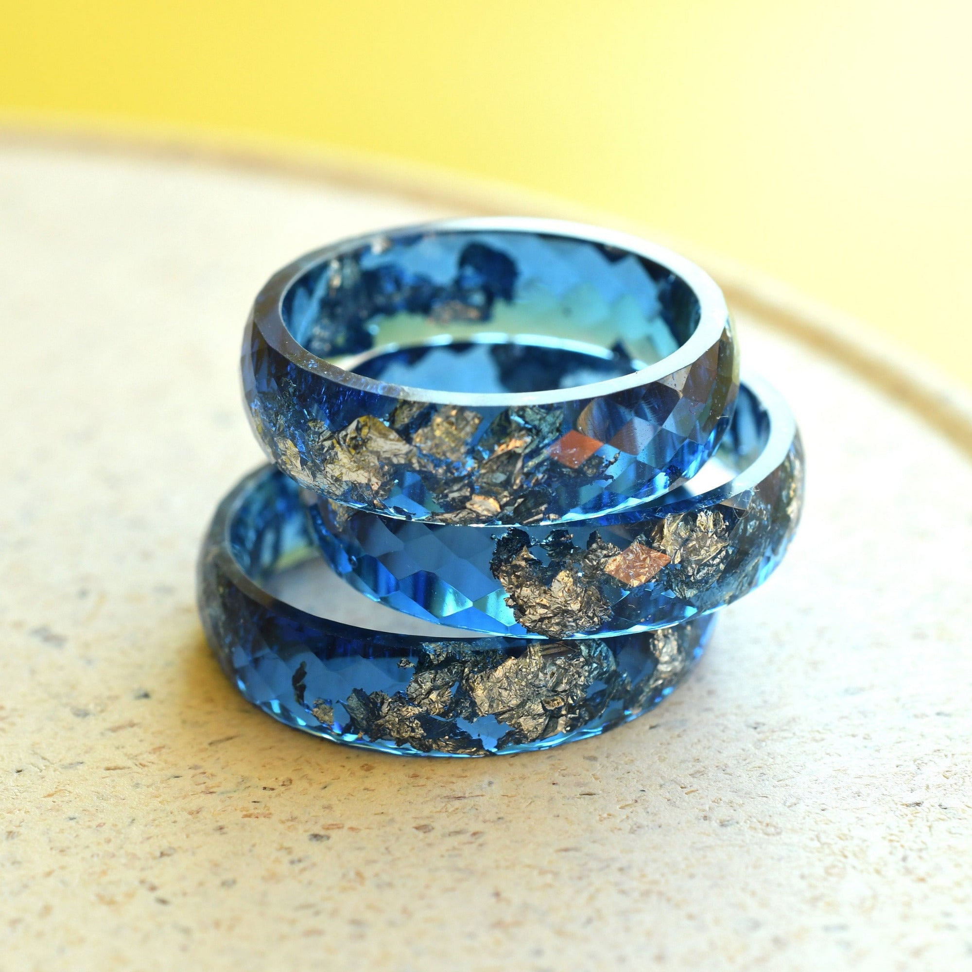 Flatlay of Midnight Signal Ring showing navy resin with silver accents