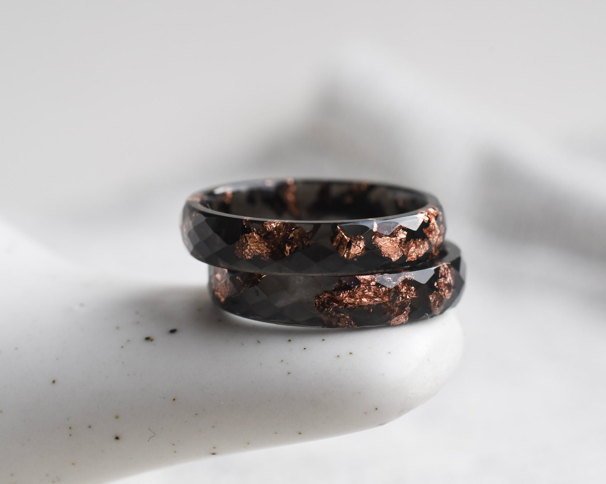 Deep black resin ring with metallic rose gold shimmer Vienna