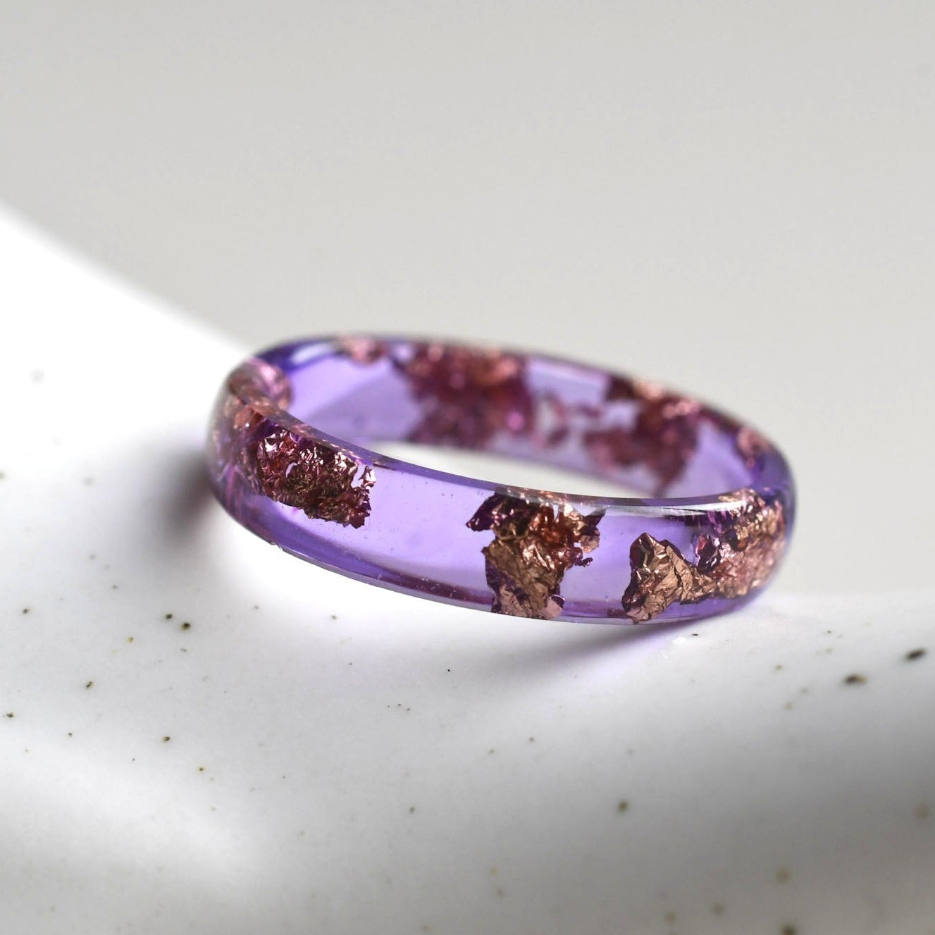 purple resin ring with rose gold leaf
