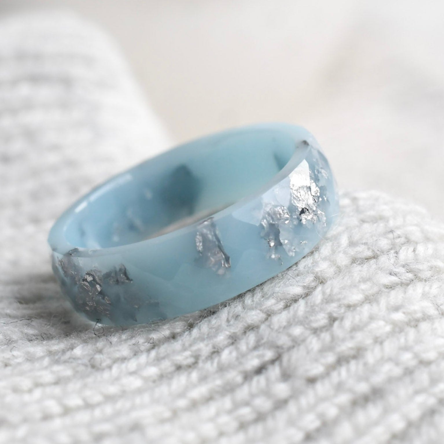 Faceted glacier blue resin stacking ring with metallic silver flakes handmade in Vienna