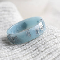 Faceted glacier blue resin stacking ring with metallic silver flakes handmade in Vienna