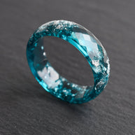 Ocean Signal faceted teal resin ring silver flakes