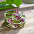 Thin clear resin ring with real moss and white alyssum flowers