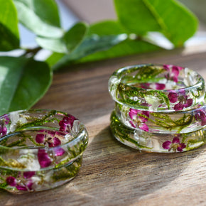 Thin clear resin ring with real moss and white alyssum flowers