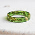 Slim faceted moss green resin stacking ring with metallic gold leaf handmade in Vienna