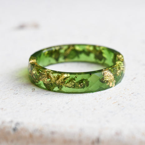 Slim faceted moss green resin stacking ring with metallic gold leaf handmade in Vienna
