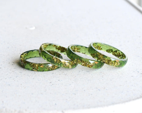 Moss green resin ring with gold flakes handmade by Resity in Vienna
