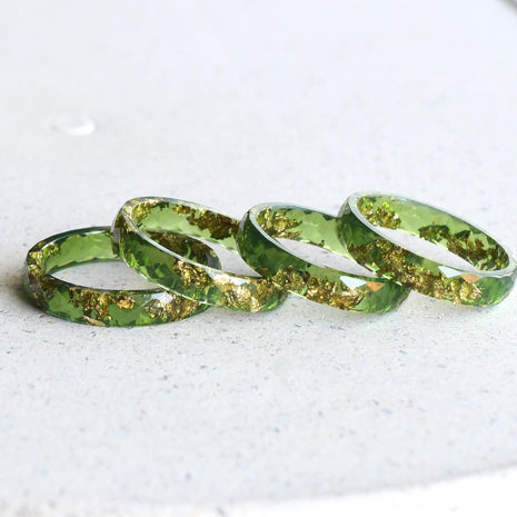 Moss green resin ring with gold flakes handmade by Resity in Vienna