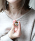 Cottagecore necklace with moss, mushrooms, and real flowers preserved in clear resin