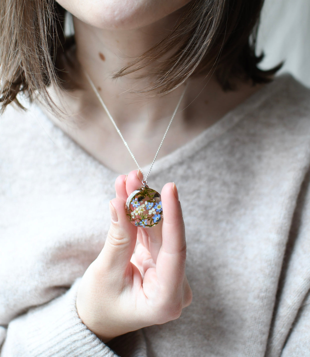 Cottagecore necklace with moss, mushrooms, and real flowers preserved in clear resin
