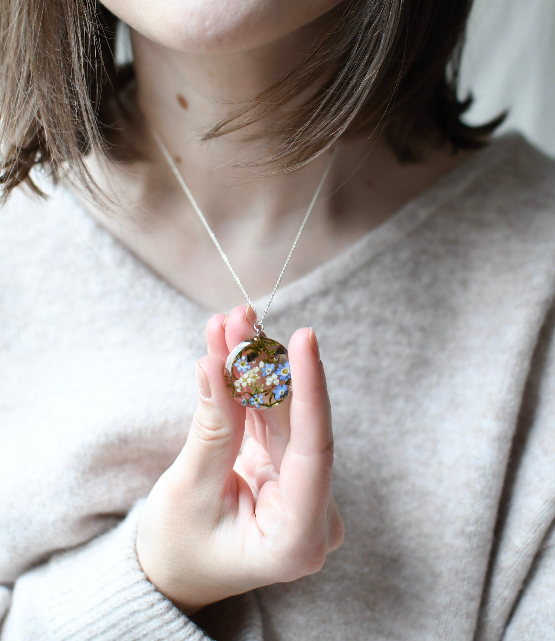 Cottagecore necklace with moss, mushrooms, and real flowers preserved in clear resin
