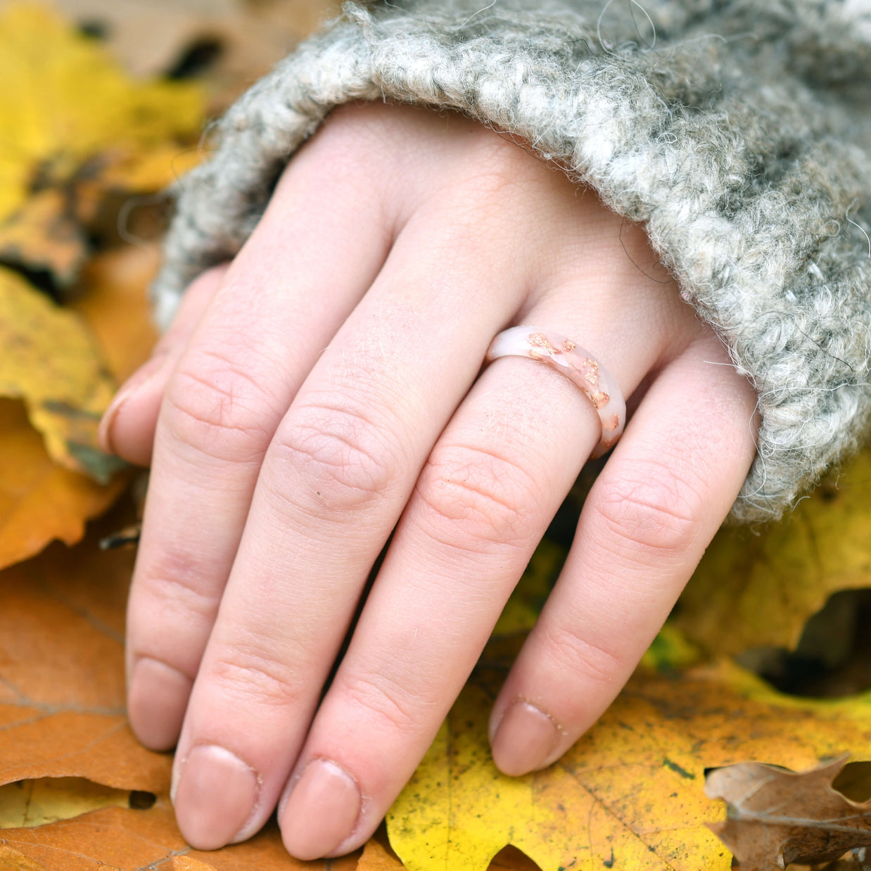 Handmade off-white faceted resin ring with rose gold leaf — crafted in Vienna by Resity