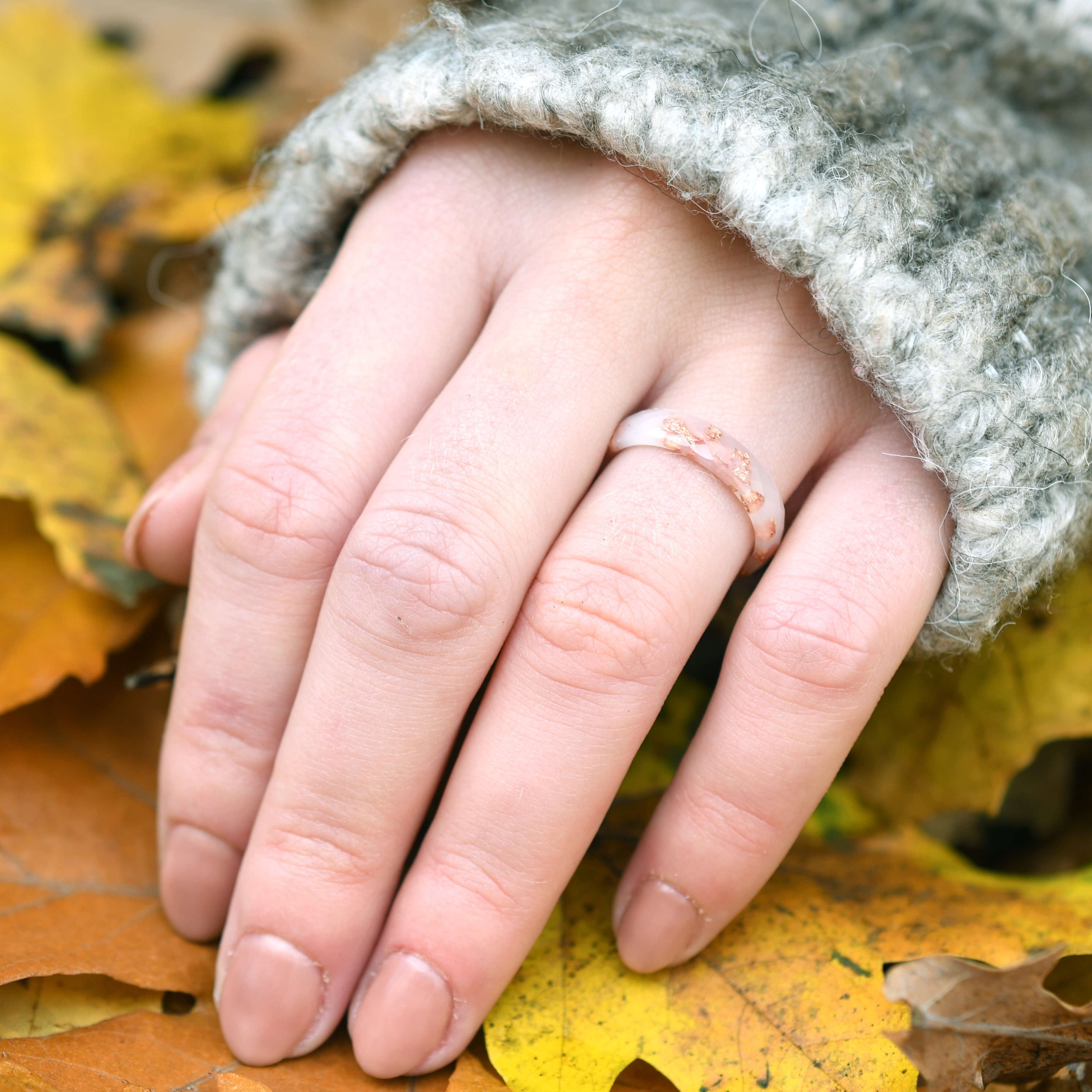 Handmade off-white faceted resin ring with rose gold leaf — crafted in Vienna by Resity