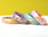 Faceted pastel resin rings with shimmering gold leaf — handmade jewelry
