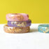 Pastel resin rings with gold leaf handmade by Resity in Vienna — pink, blue, purple, and nude
