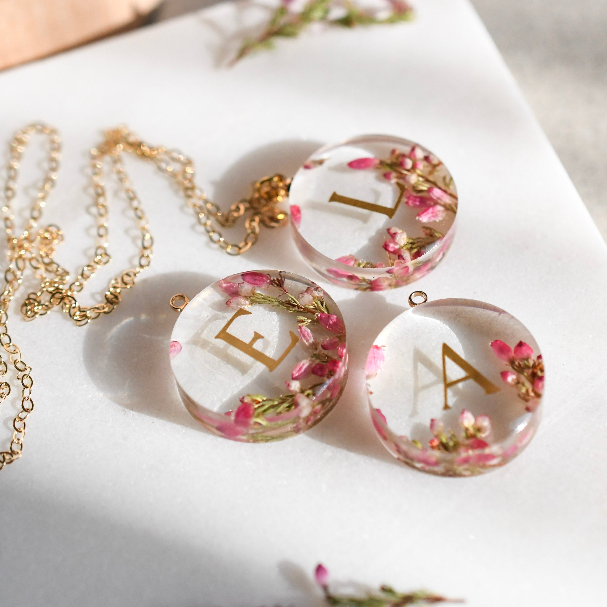Real pink heather flower resin pendant with custom name embedded inside
