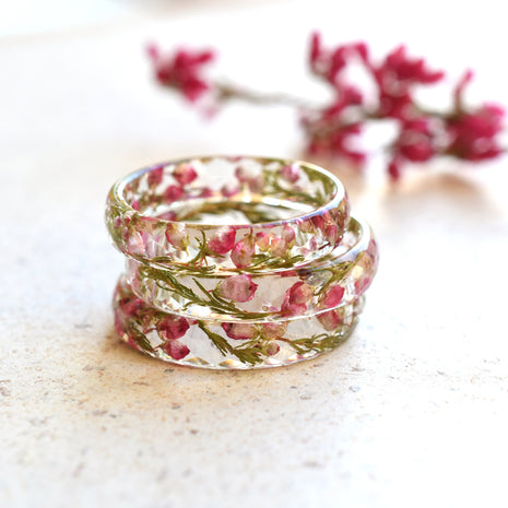 Delicate resin ring with dried pink heather flowers