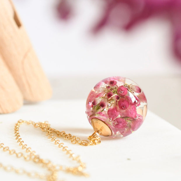 Heather Moon pink heather resin sphere necklace clear pendant