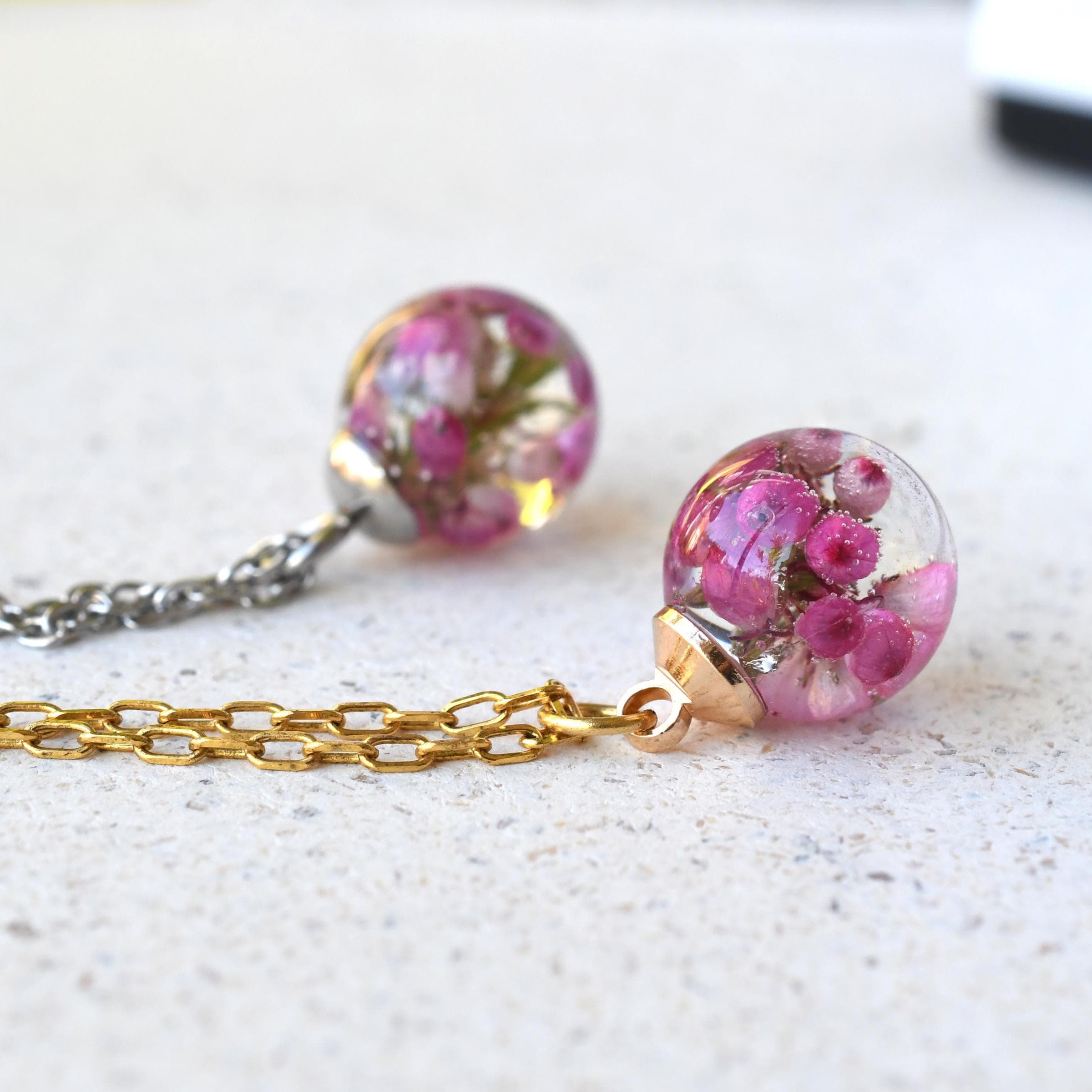 Close-up of Pink Glade Necklace showing pink heather petals in detail