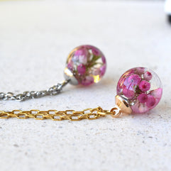 Close-up of Pink Glade Necklace showing pink heather petals in detail