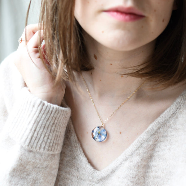 Pressed blue Siberian Squill pendant on a gold-filled chain, handmade in Austria