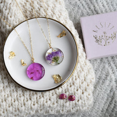 Pressed purple aster flower necklace in clear resin — 20 mm round botanical pendant