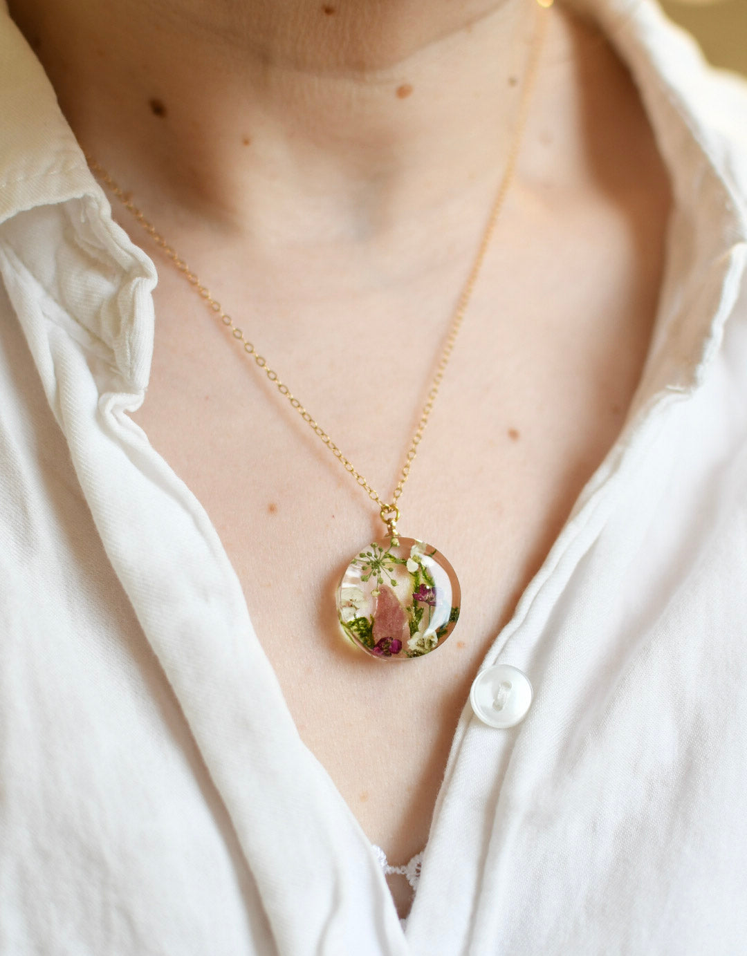 Terrarium Bloom Necklace worn on model — botanical and crystal jewelry