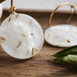Real dandelion seed earrings in clear resin with gold hoops, unique botanical jewelry for everyday wear