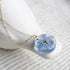 Real pressed Siberian Squill pendant in clear resin on a delicate gold chain