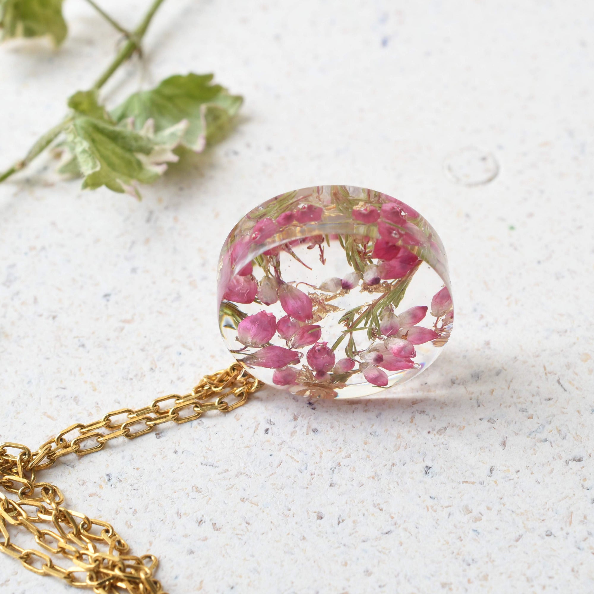 Real flower pendant necklace with preserved heather blossoms in resin