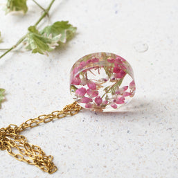 Real flower pendant necklace with preserved heather blossoms in resin