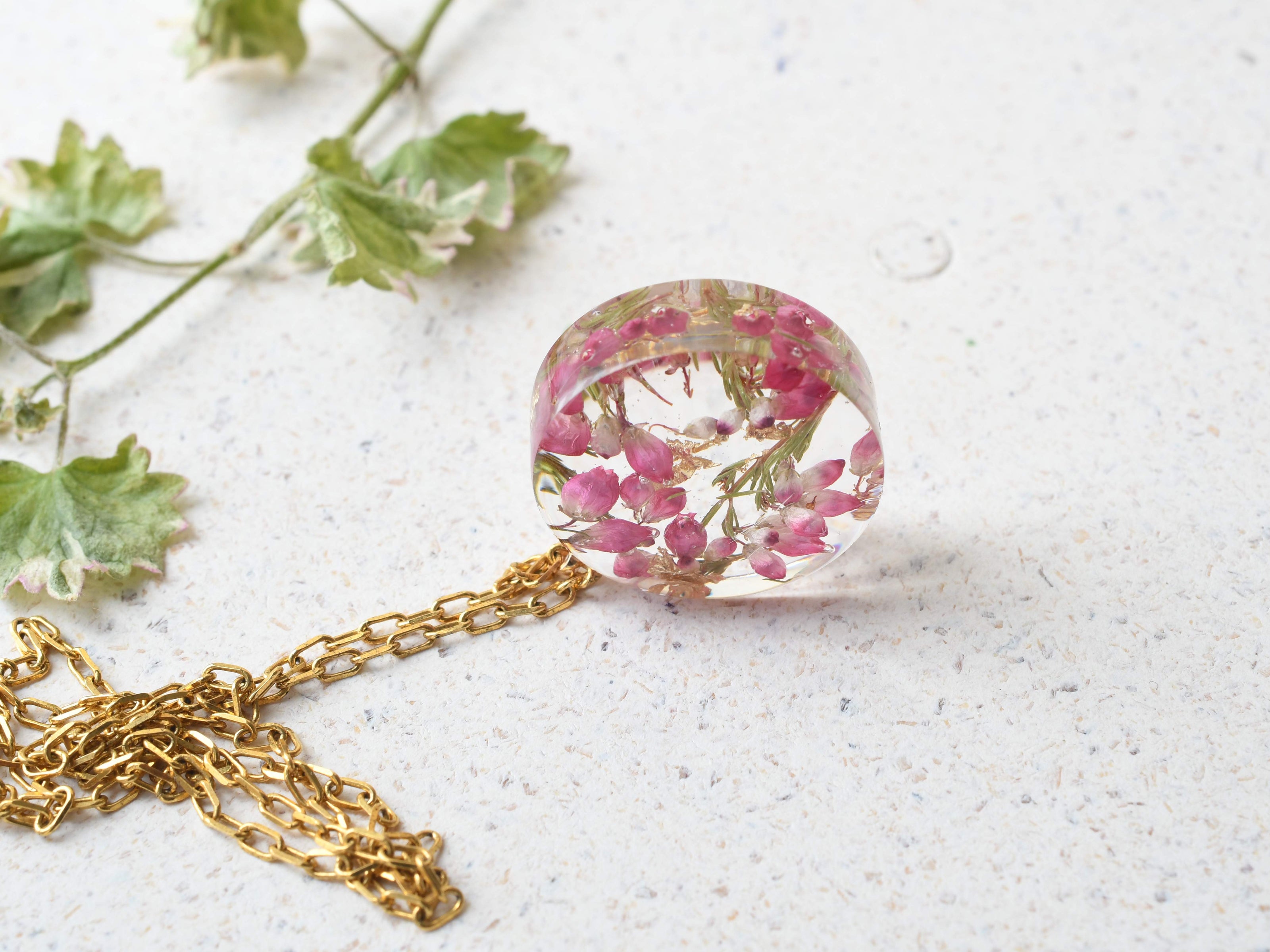 Real flower pendant necklace with preserved heather blossoms in resin