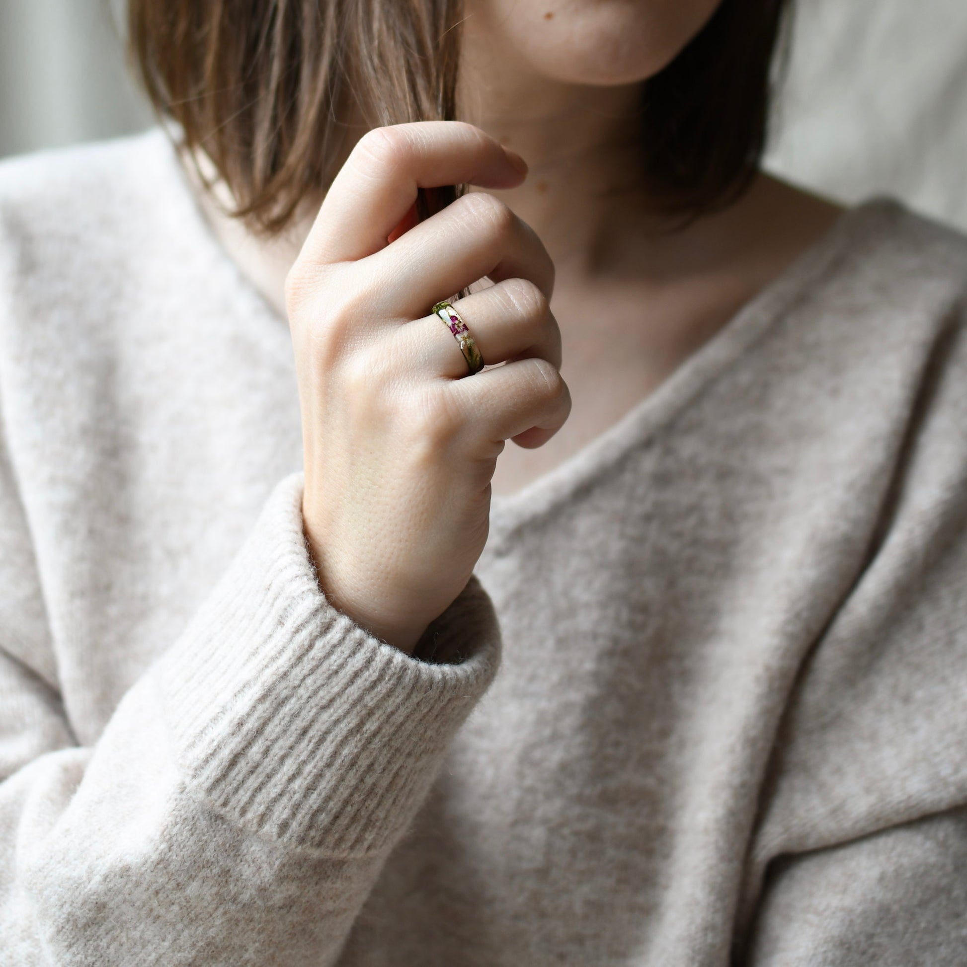 Real green moss preserved in resin ring Vienna