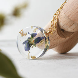 Handmade violet flower necklace — February birth flower jewelry crafted in Vienna by Resity