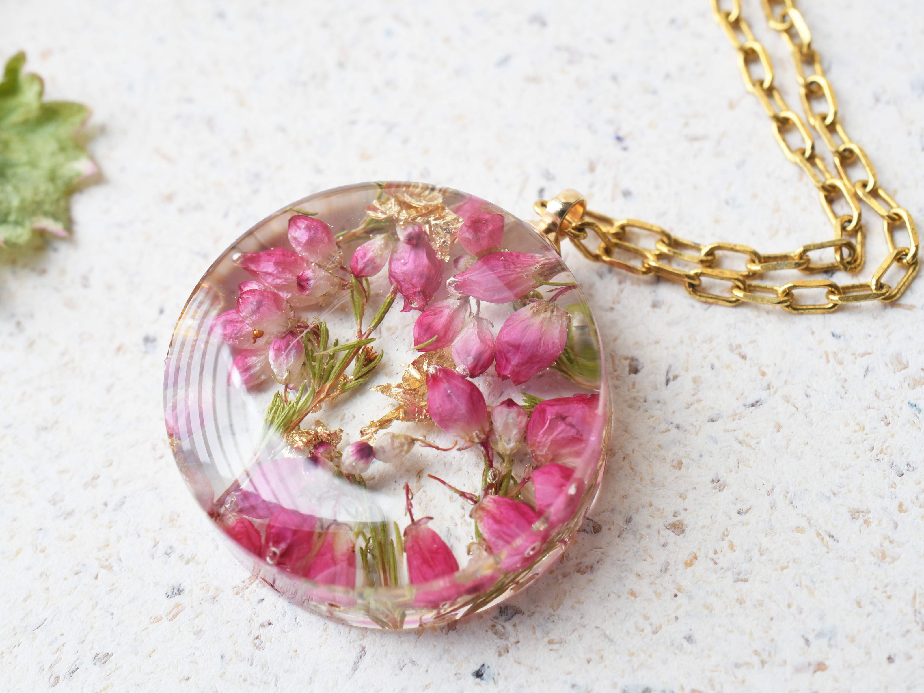 Botanical resin pendant with real heather flowers on gold-plated chain