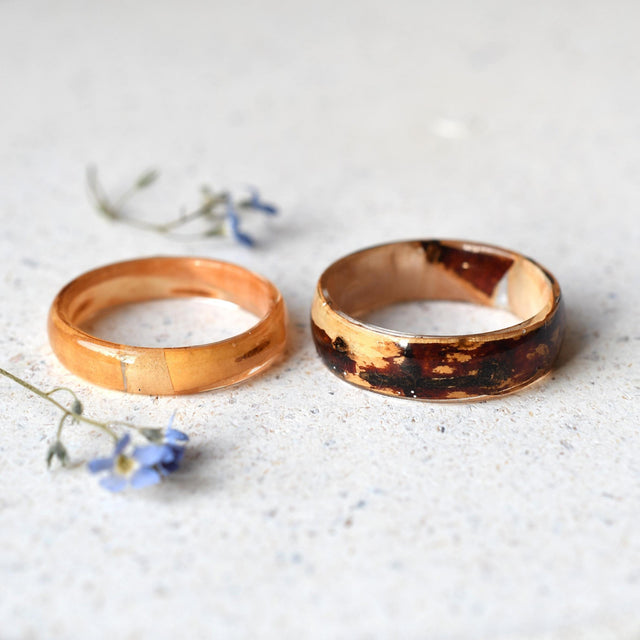 Close-up of resin ring with birch wood detail, highlighting natural texture