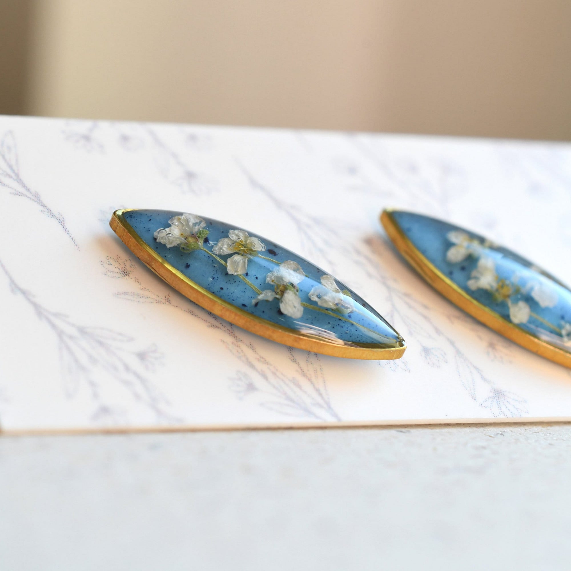 Blue stud earrings with real pressed flowers and surgical steel posts