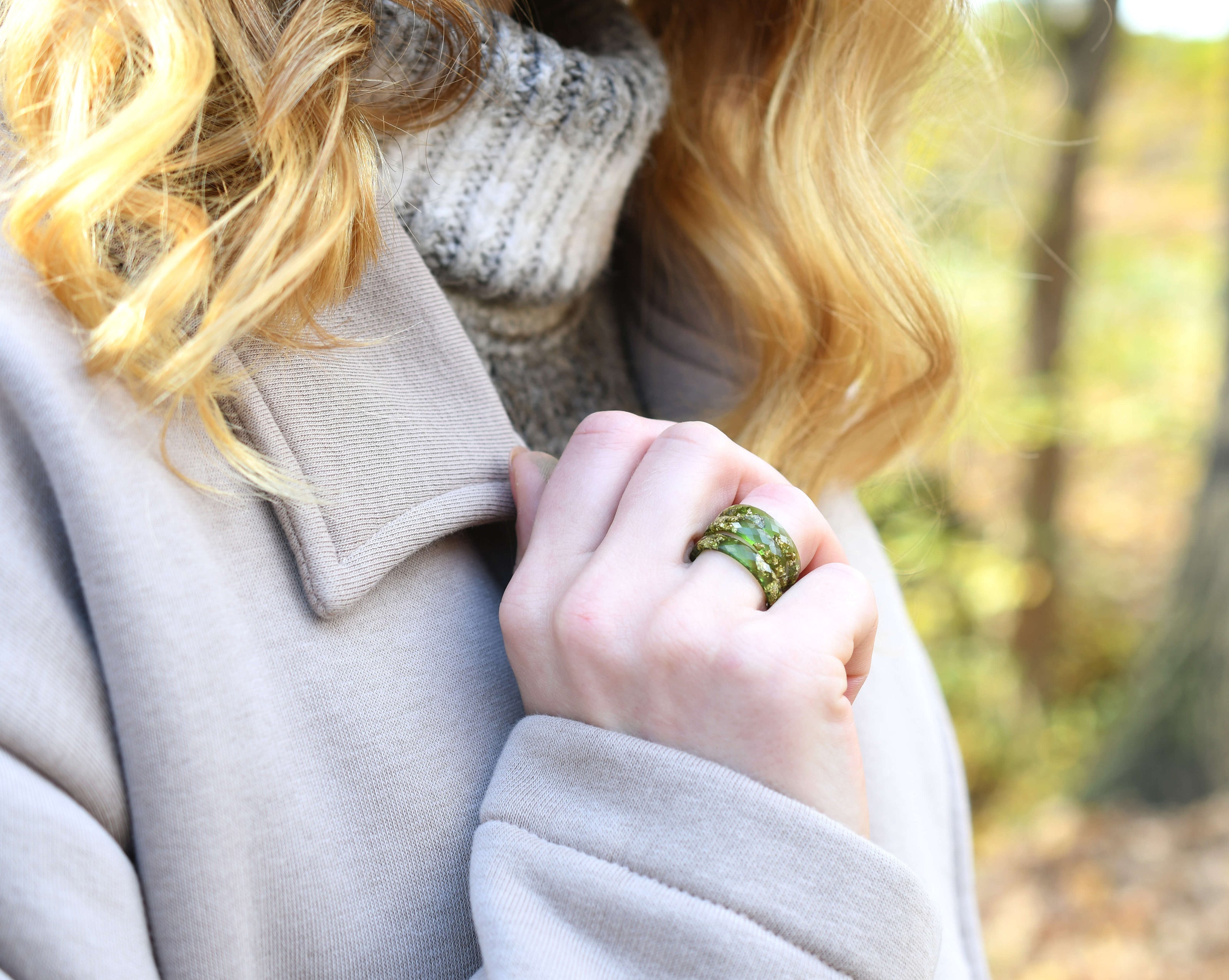 Moss green resin ring with gold flakes worn on hand — unisex minimalist jewelry