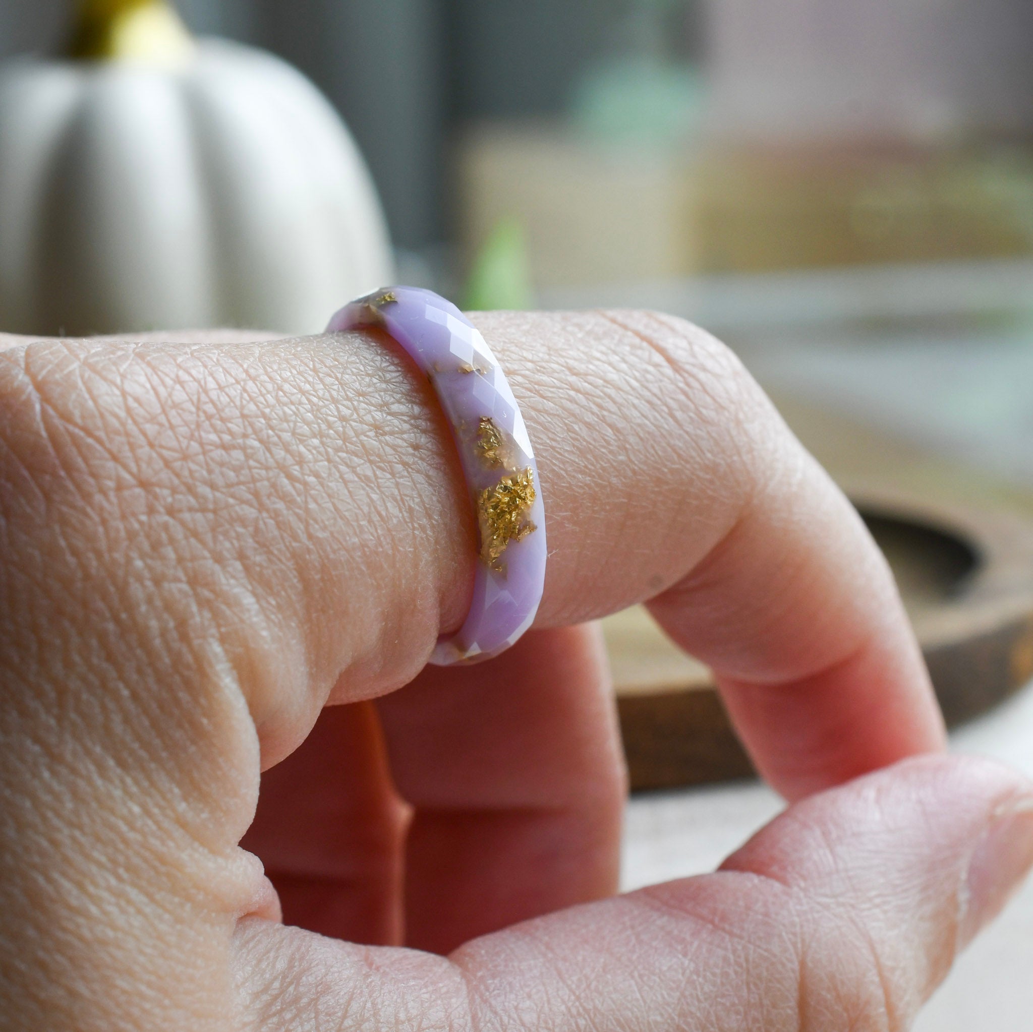 Handmade purple pastel resin ring worn on hand — minimalist jewelry