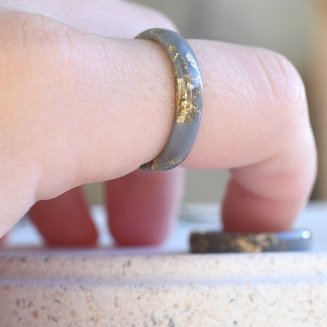 Handmade matte gray resin ring worn on hand — unisex modern design