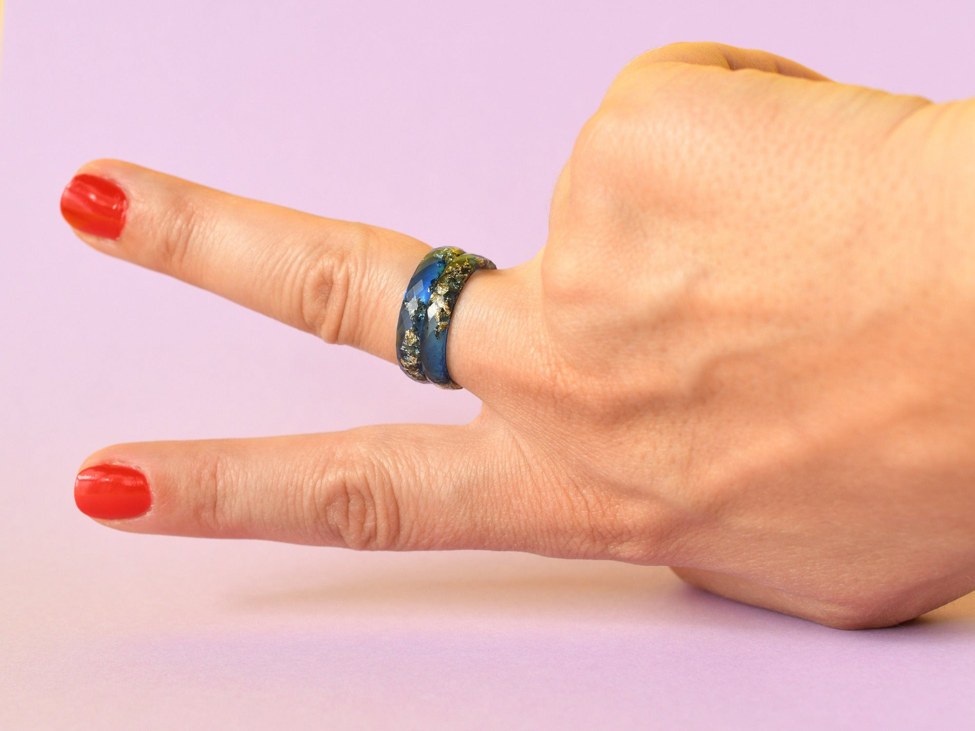 Two sapphire blue resin rings worn on hand — unisex minimalist ring