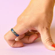 Sapphire blue resin ring worn on hand — unisex minimalist ring