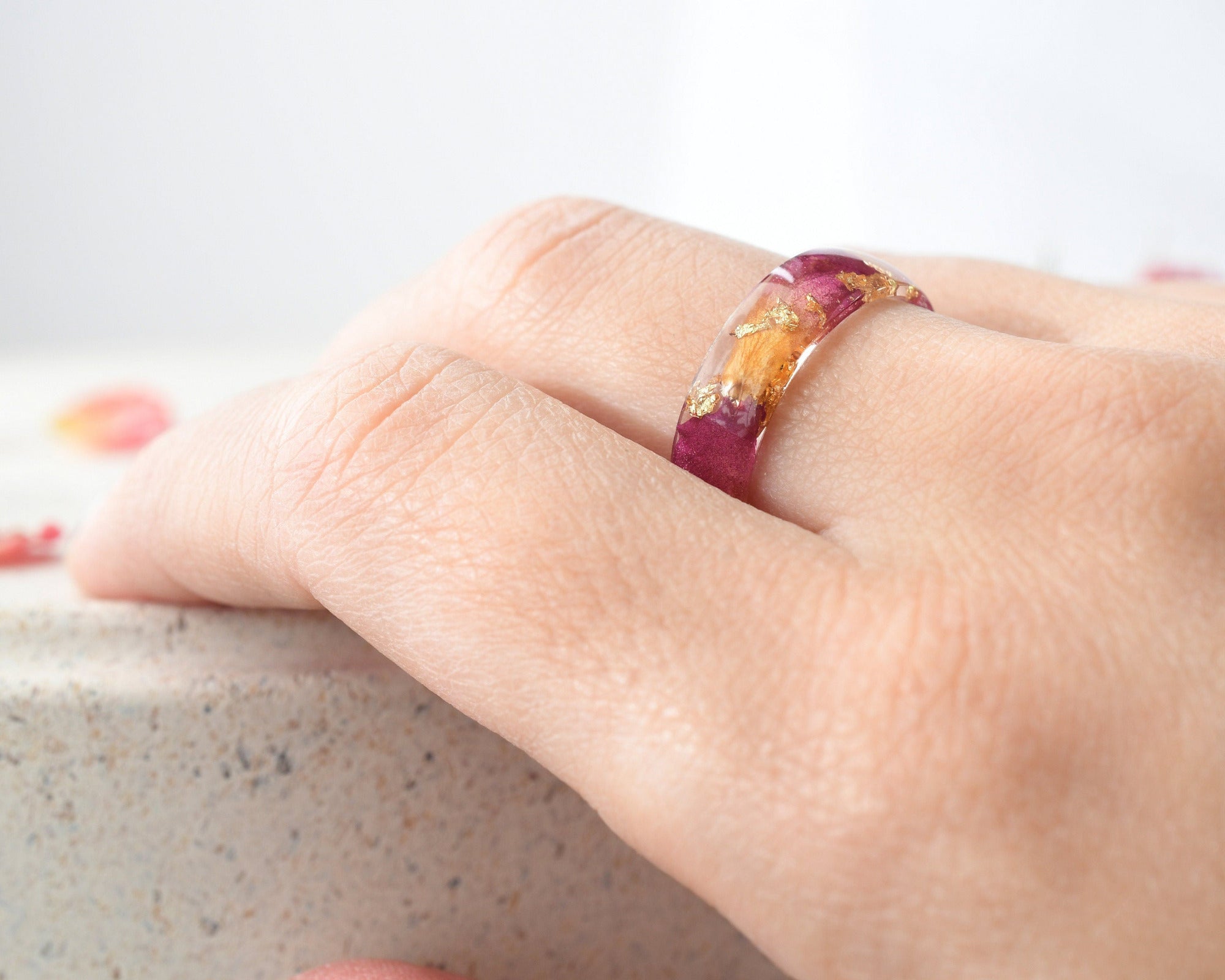 Rose Bloom Ring worn on hand, showcasing floral detail and elegant design