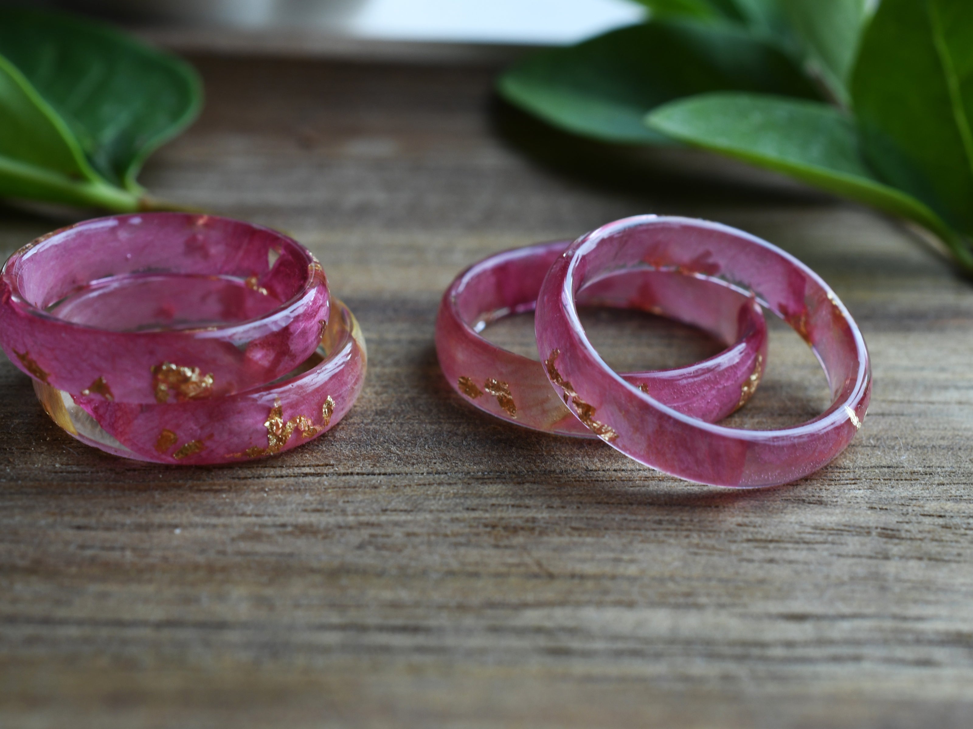 side view of pink resin ring with gold leaf – one-of-a-kind piece